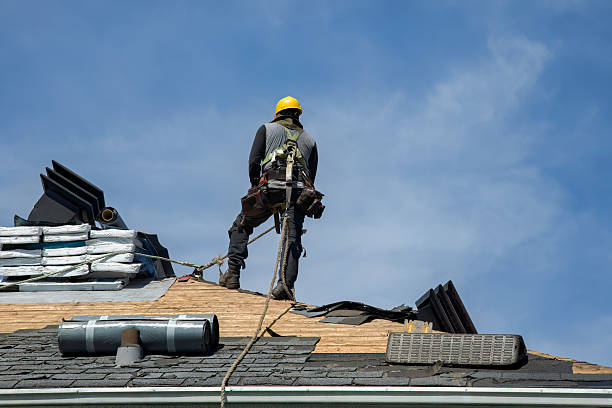 Professional Roof Replacement technician working in Ware, MA